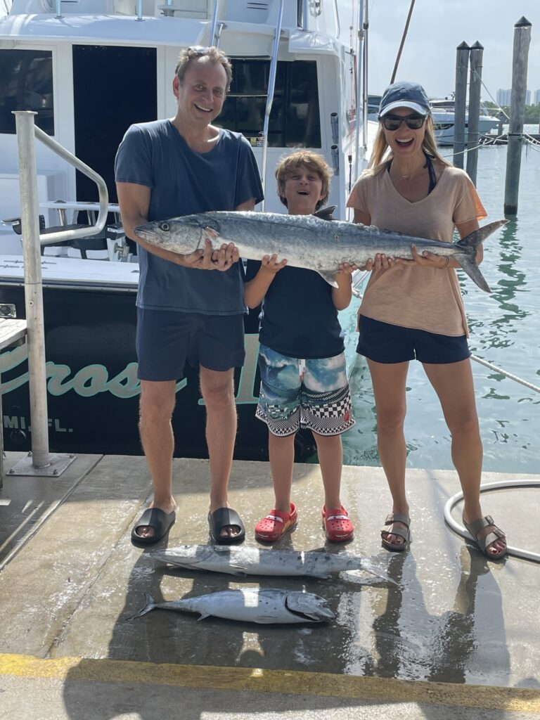 This family caught a trophy sized kingfish.