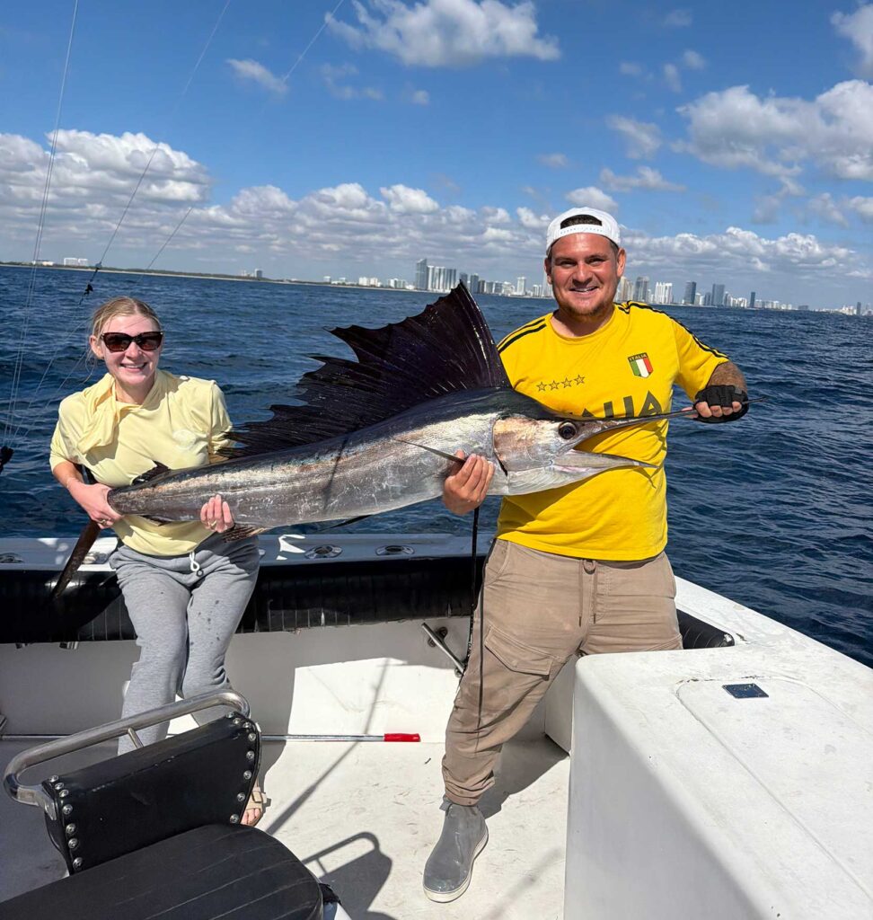 Her first sailfish caught on the reef off Miami Beach.